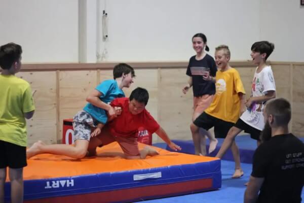 children smiling during a fun fitness game in class in eltham australia children smiling during a fun fitness game in class in eltham australia