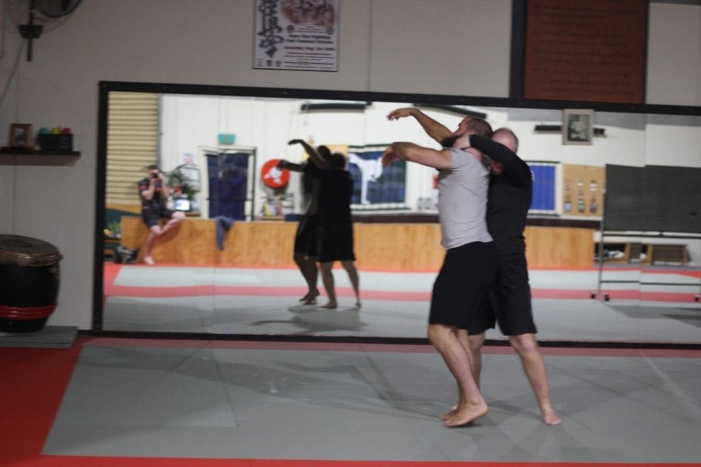 A rear naked choke being performed during sparring at Functional fitness Eltham